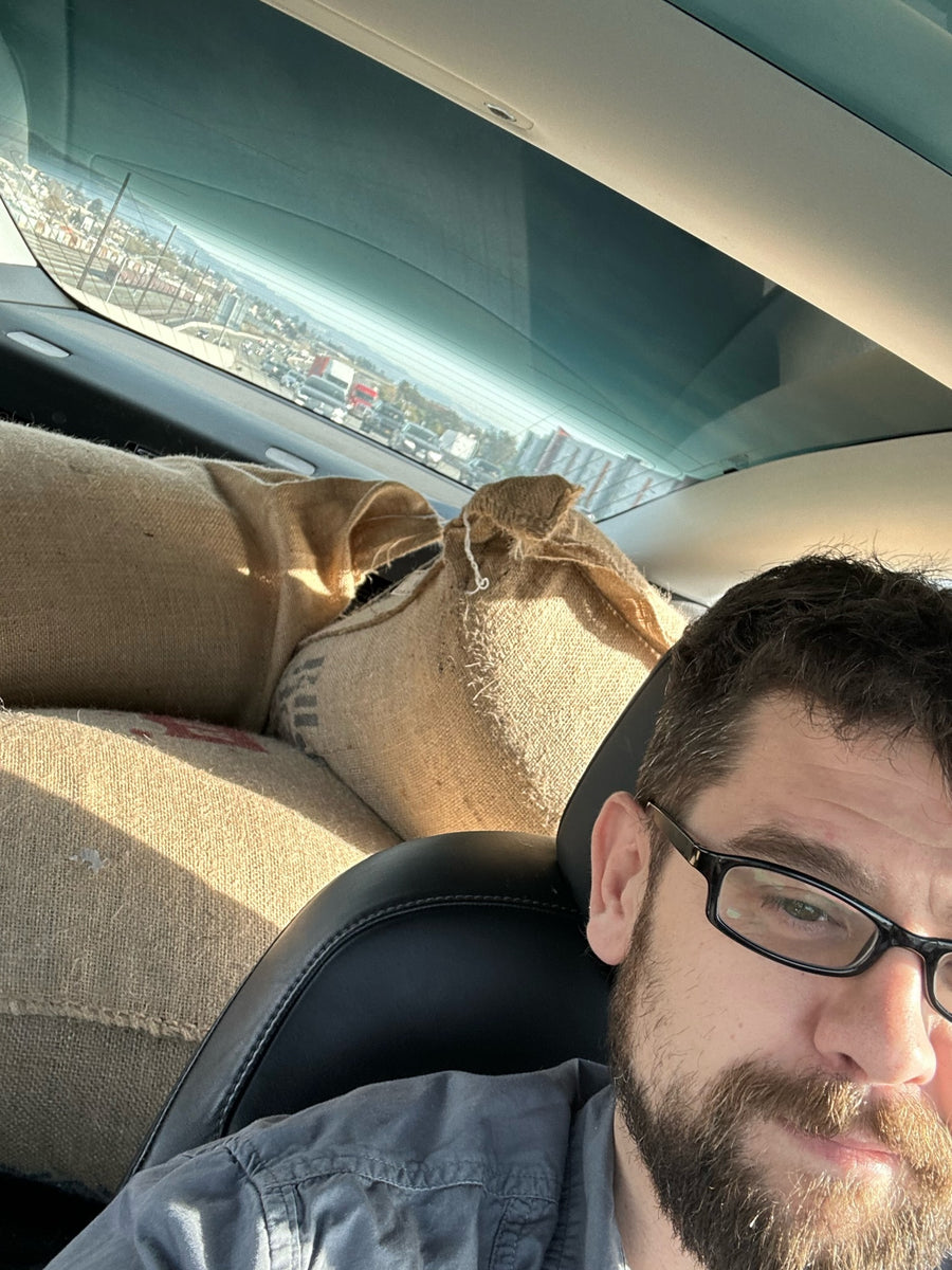 Barista pouring coffee